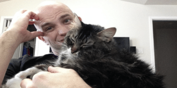 Man Refuses to Give Up His Cat